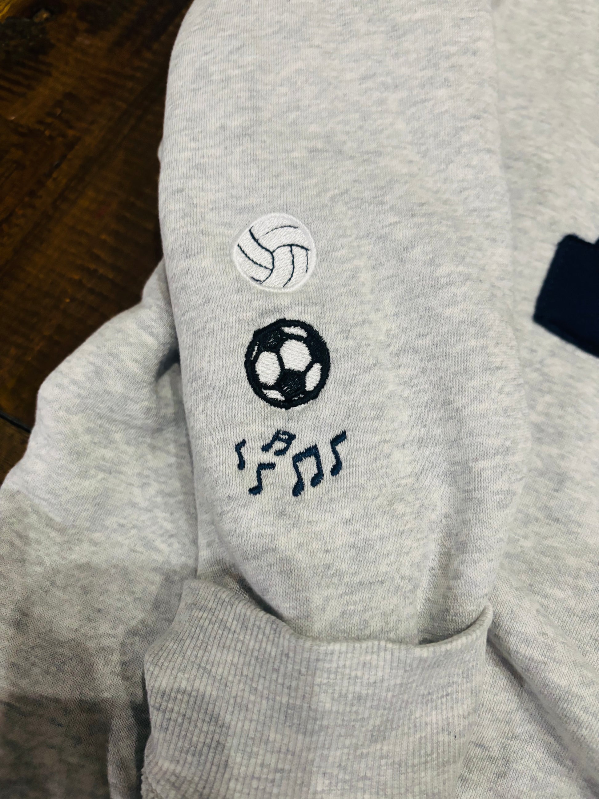 Puffy Bearkat Sweatshirt with sports logo on sleeve